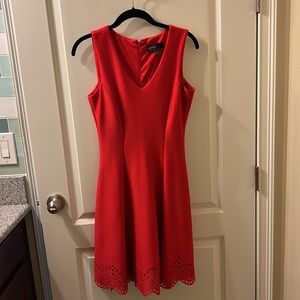 Beautiful red professional dress. Dress up with your favorite jean jacket.